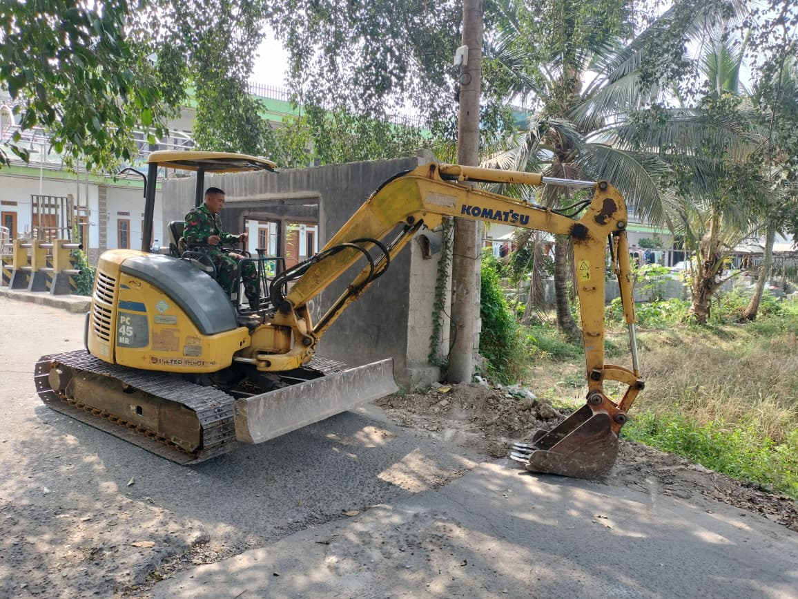 Satgas TMMD Kodim 0510/Tigaraksa Bersihkan Jalur untuk Pembangunan Infrastruktur