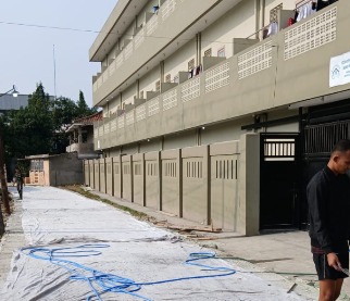 Satgas TMMD Tigaraksa Fokus pada Perawatan Beton Setelah Pengecoran Jalan